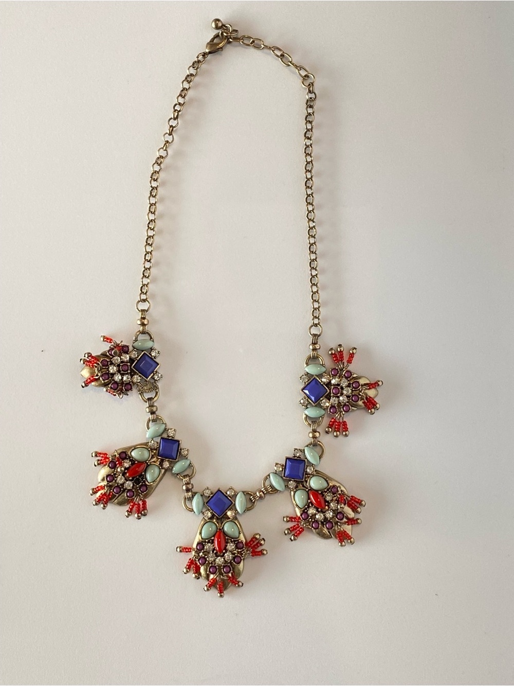 Gold-Tone Multicolor Statement Necklace — Red & Blue Accent